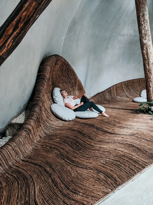 Woman Lying On Brown Wooden Bed 3700254